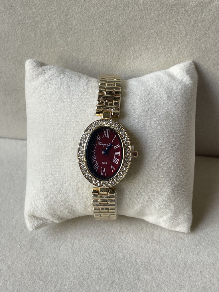 Maroon oval crystal watch